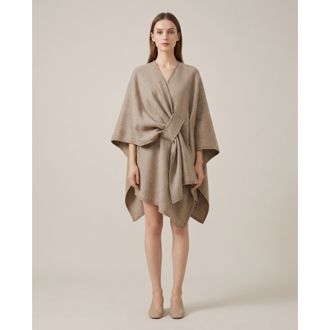 Omkeerbare poncho-wrap voor moeiteloos laagjes dragen  
