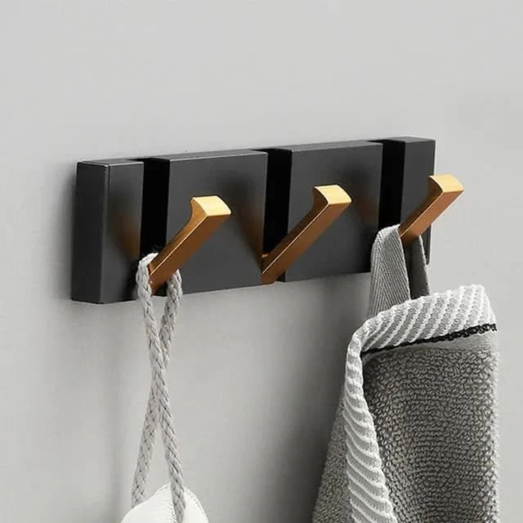 Gancho de pared abatible para almacenamiento sin desorden
