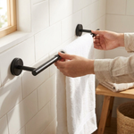 Barre porte-serviettes réglable pour un séchage gain de place