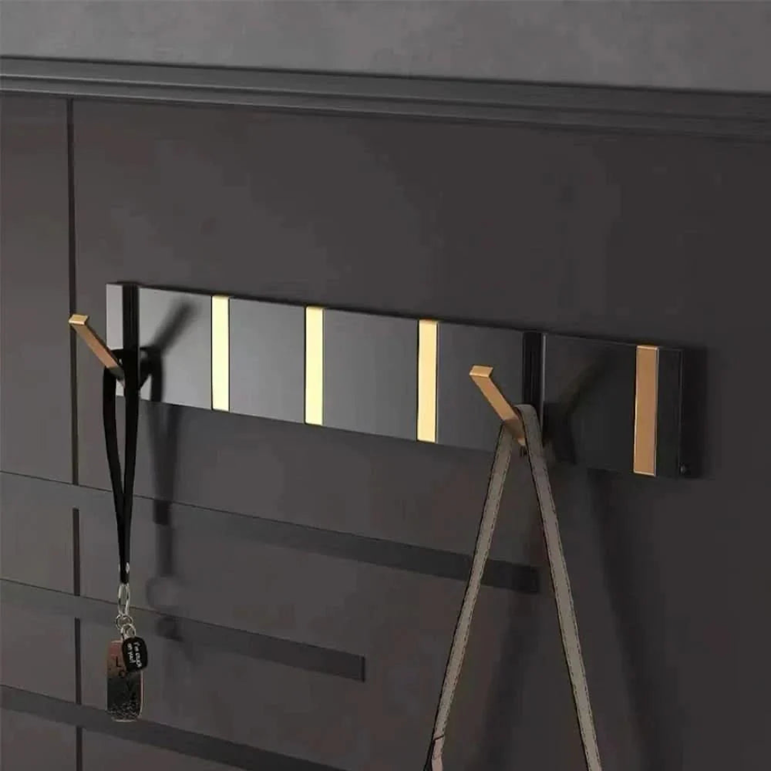 Gancho de pared abatible para almacenamiento sin desorden