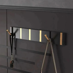 Gancho de pared abatible para almacenamiento sin desorden
