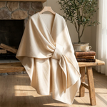 Omkeerbare poncho-wrap voor moeiteloos laagjes dragen  