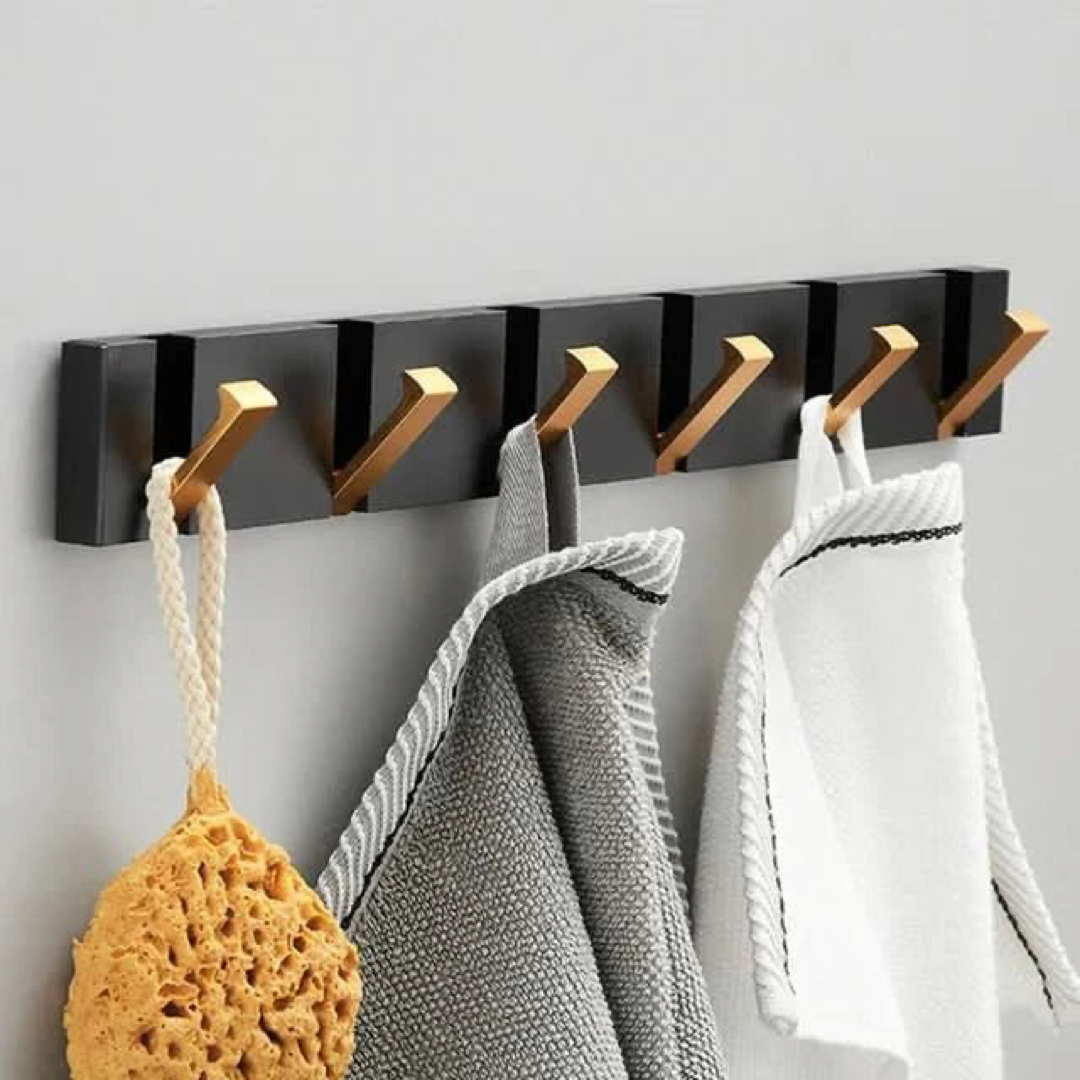 Gancho de pared abatible para almacenamiento sin desorden