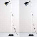 Lampada da terra ad arco nordico per una lettura accogliente