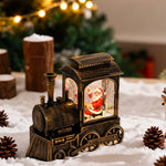 Weihnachtszug-Lichter mit Schneefall-Glanz