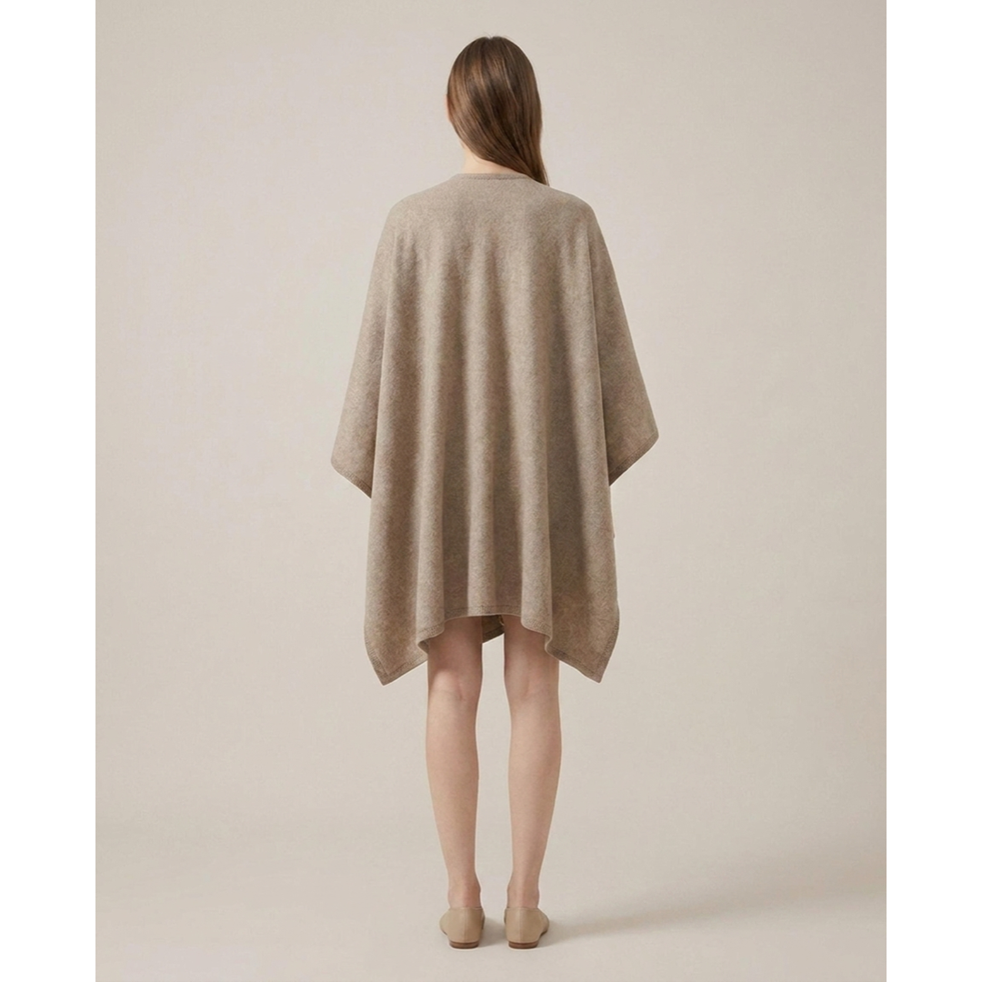 Omkeerbare poncho-wrap voor moeiteloos laagjes dragen  