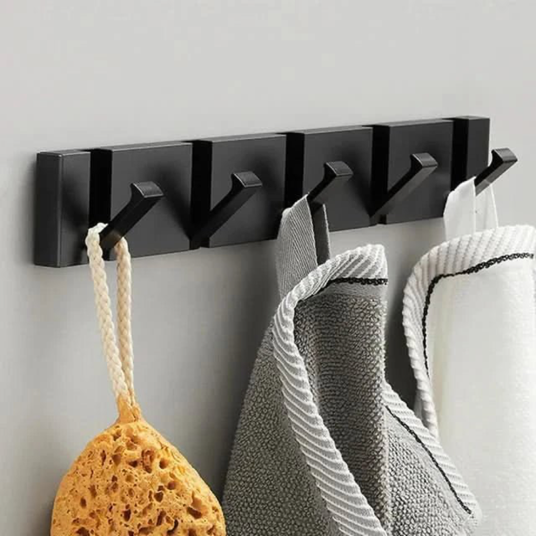 Gancho de pared abatible para almacenamiento sin desorden