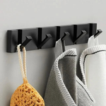 Gancho de pared abatible para almacenamiento sin desorden