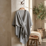 Omkeerbare poncho-wrap voor moeiteloos laagjes dragen  