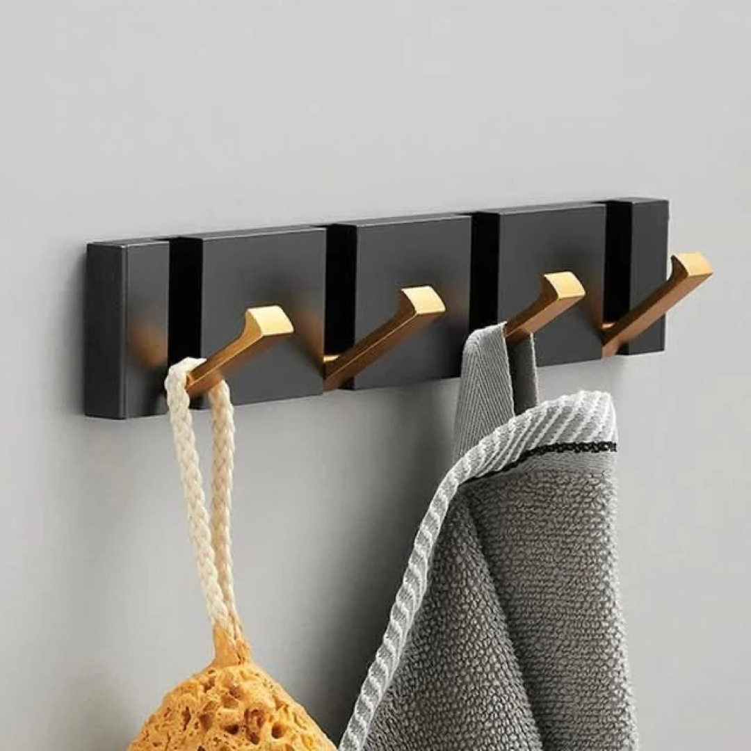 Gancho de pared abatible para almacenamiento sin desorden