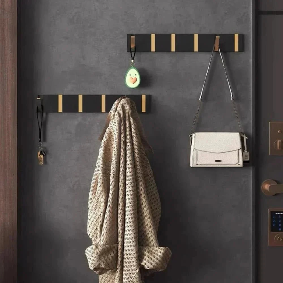 Gancho de pared abatible para almacenamiento sin desorden