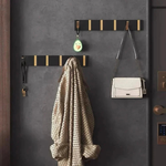 Gancho de pared abatible para almacenamiento sin desorden