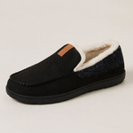 Black wool-look house loafer on a light-gray studio background
